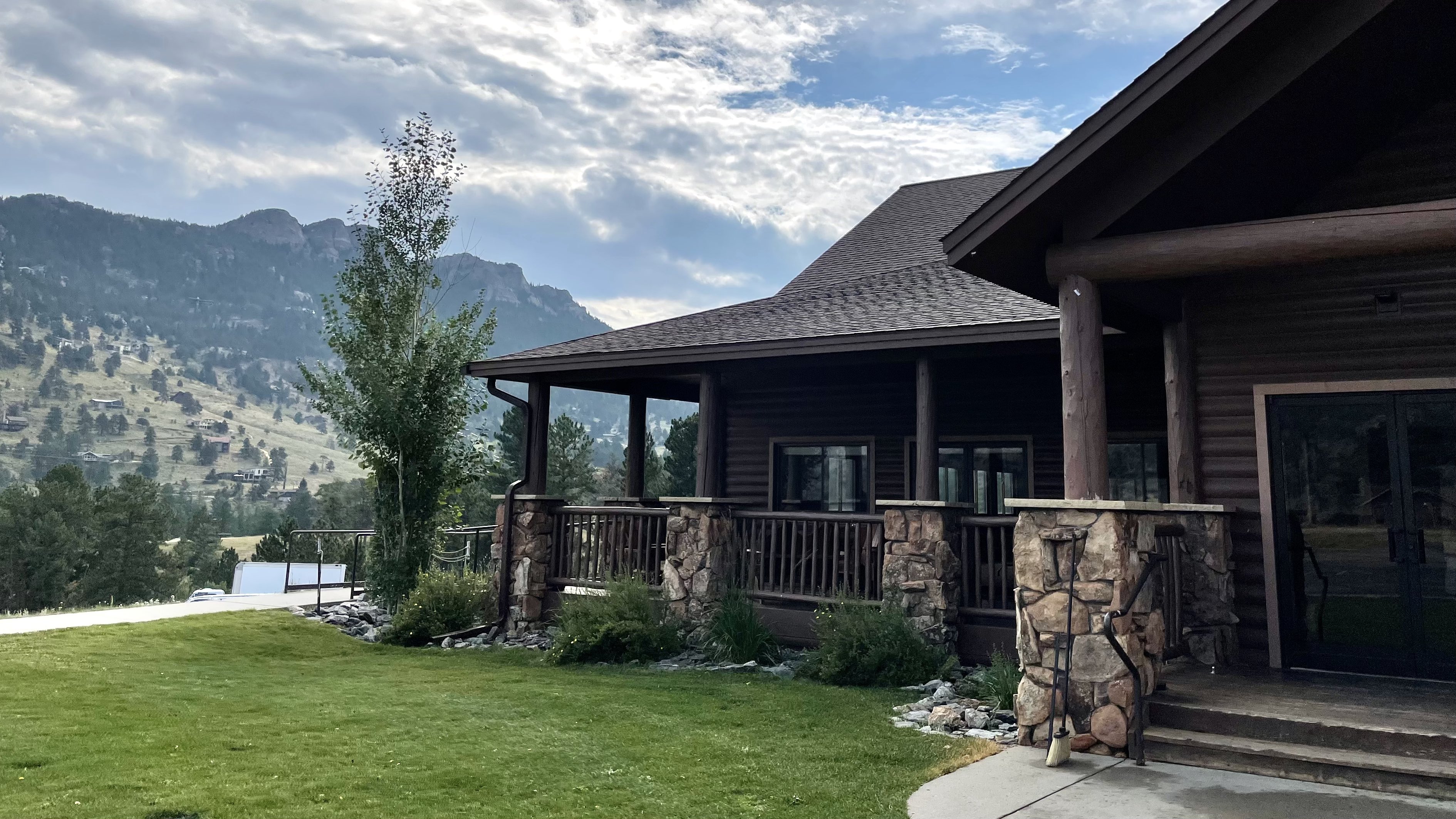 Building at YMCA of the Rockies with scenic mountain background